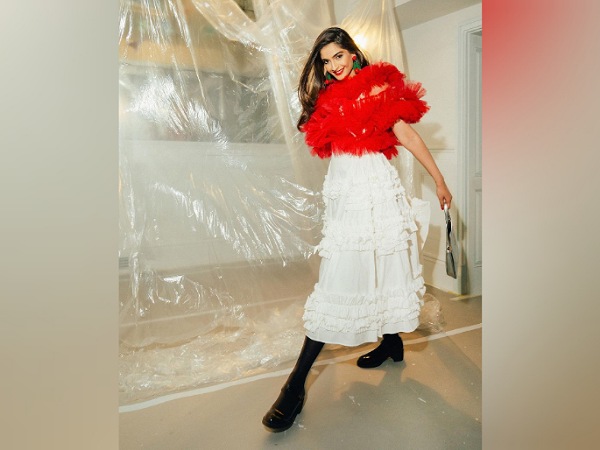 Sonam Kapoor In Feather Top And Ruffle Skirt