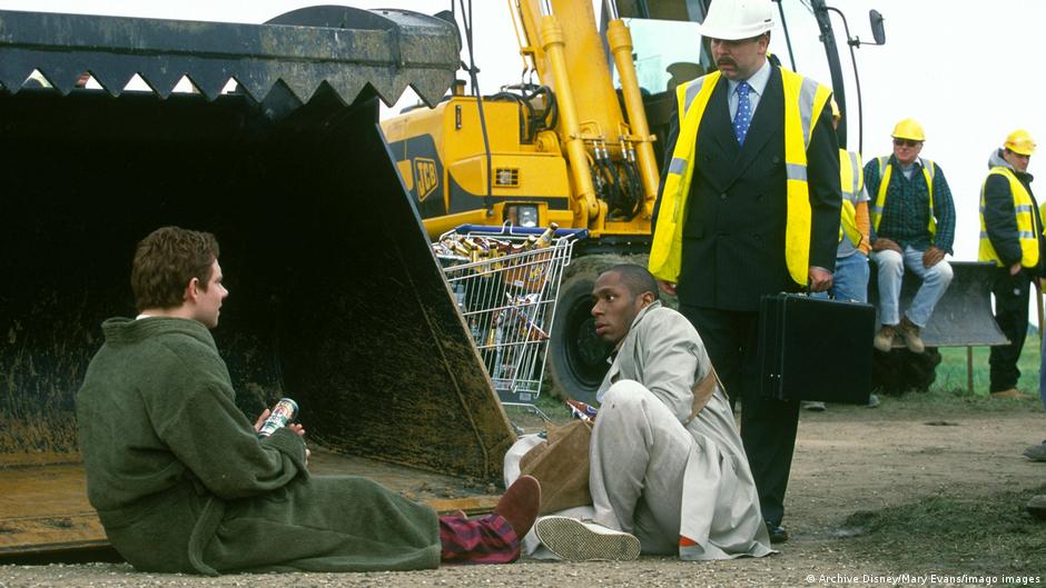 Arthur Dent delaying bulldozers from demolishing his home in scene from 2005 film Arthur Dent delaying bulldozers from demolishing his home in scene from 2005 film