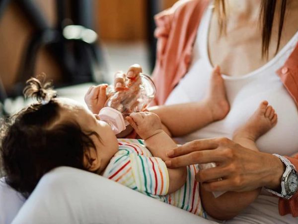 Why Babies Spit Up: What Causes It