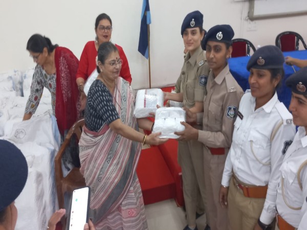 Meena Mehta with police constables