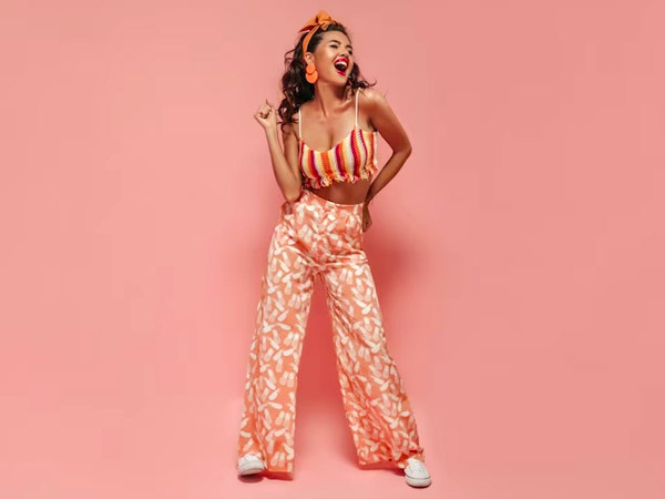 Summer is already upon us and from a style point of view, it makes sense to wear comfy and stylish outfits. Tropical style ensembles make for a perfect choice to define summer fashion and raise the style quotient. From nature-inspired prints to eco-friendly accessories, tropical fashion is all about vibrancy and showcasing your love towards nature in bold letters! Wonder how to ace the tropical fashion? Worry not, we have curated some easy style tips for you! Here are 5 stunning ways to ace tropical fashion, especially during summer: Nature-Inspired Prints Tropical style essentially means flaunting everything that nature represents. That includes wearing an ensemble with attractive prints like florals, leaves, fruits, and more. Go for small to loud prints that suit your body shape and personal preference. Opt for a flowy summer dress, kaftan, or comfy top with a nature-inspired print! Animal Prints Animals inhabit the earth just like us and make for a huge inspiration in tropical fashion. You can opt for attractive animal print options like tiger print, leopard print, cheetah print, zebra print, snake print, and more. Opt for casual wear, athleisure wear, or an accessory like a handbag to ace the tropical style effortlessly! Vibrant Hues Nature-inspired colours like red, orange, yellow, green, brown, blue, and more can be selected in vibrant tones to showcase the tropical style in summer. Go for a vibrant colour top or printed pants to ace the casual wear. Bold prints with bold hues outfits are a fun choice to elevate your vacation fashion! Wear Khaki Take the forest officers outfit as an inspiration and opt for khaki colour ensembles. A plain or minimally printed cotton, linen shirt and matching trousers are a classic combo for casual summer wear. Such tone-on-tone outfits help add a chic, understated look to you! Eco-Conscious Accessories Think eco-conscious accessories when featuring a tropical fashion. Opt for a straw hat, jute handbag, cotton backpack, and more such accessories that hold a tag of eco-friendly. Eco-friendly materials made accessories not only make a conscious choice but also makes a lasting impact style-wise! Images: Freepik