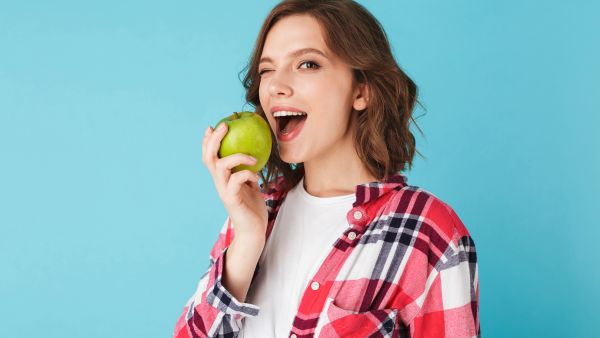 How To Remove Food From Your Teeth