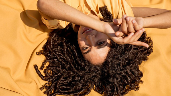 6 Summer Haircare Tips For Curly Hair That Are Essential To Keep Your Locks Luscious In The Heat