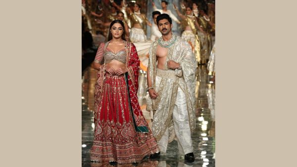 India Couture Week 2024 Wamiqa Gabbi Wows In Abu-Sandeep s Ivory Lehenga With Webbed Veil