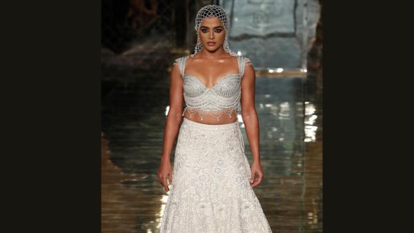 India Couture Week 2024 Wamiqa Gabbi Wows In Abu-Sandeep s Ivory Lehenga With Webbed Veil