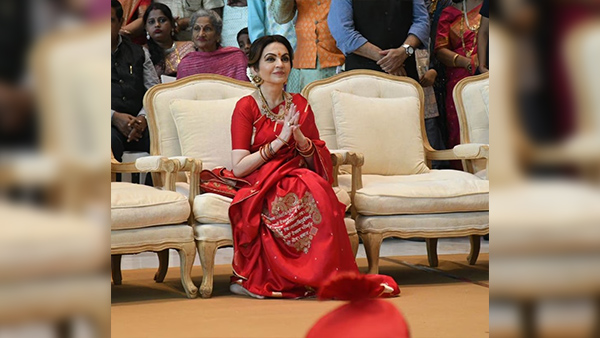 From Gayatri Mantra Saree To Shrinathji Earrings Decoding Nita Ambani s Heritage Look At Mass Wedding