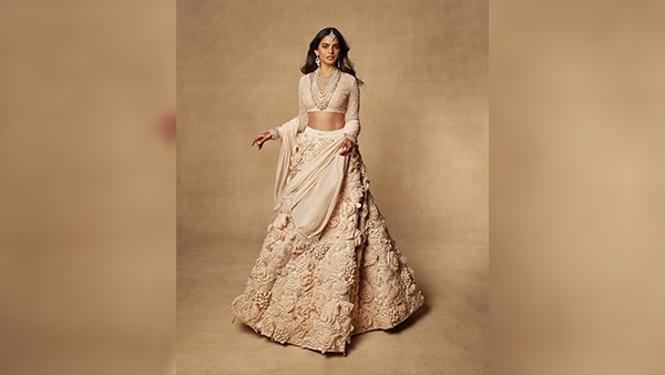 Anant-Radhika Wedding Sabyasachi 3D Lehenga To Schiaparelli Sari Isha Ambani s Best Outfits