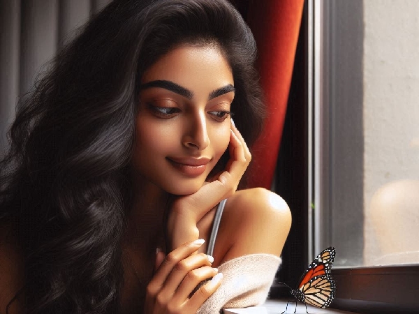 Girl gazing at butterfly