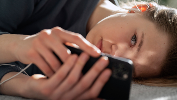 Lonely girl with mobile