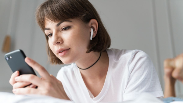 person using earphones all day