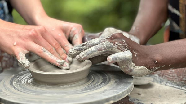 friends learning pottery