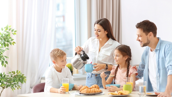 parents eating together with child