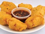 ಸಾಮಾನ್ಯವಾಗಿ  ಮಾಡುವ ಬಾಳೆ ಹಣ್ಣಿನ ಬೋಂಡಾ ಇದಲ್ಲ