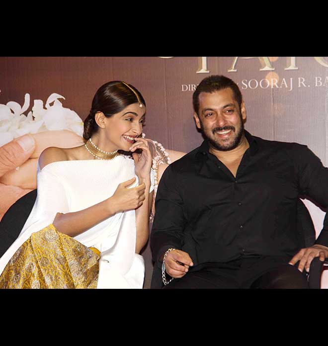 Sonam In Gorgeous White, Salman In Raven Black