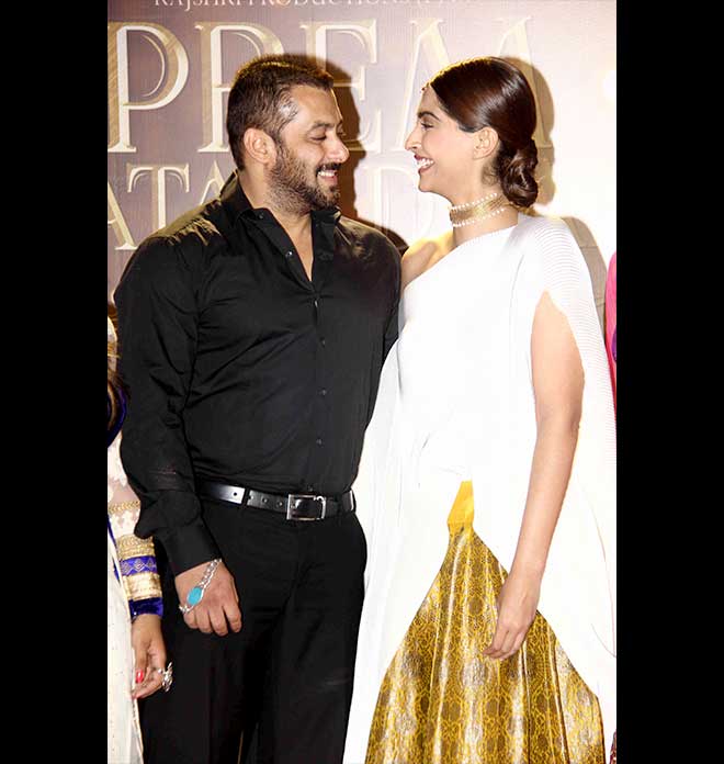 Sonam In Gorgeous White, Salman In Raven Black