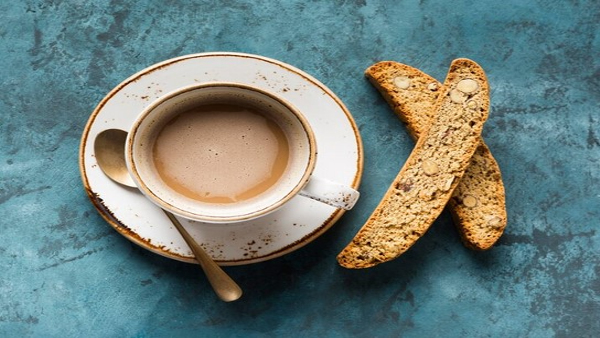 Consuming Rusk With Tea 