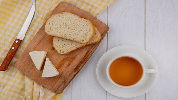 Consuming Rusk With Tea 