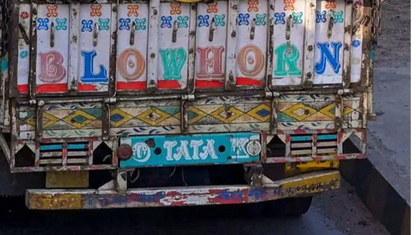 Horn ok please is written behind the lorry What does this mean