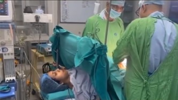 Mother Chanting Mantra Of Lord Krishna During Operation