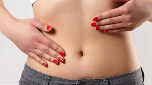 touching belly button