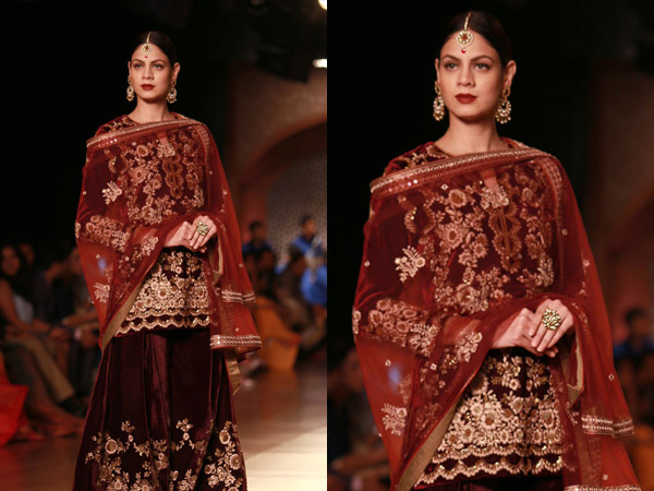 എഐസിഡബ്ല്യൂ, റെയ്‌നു ടണ്ടന്‍ ഡിസൈന്‍