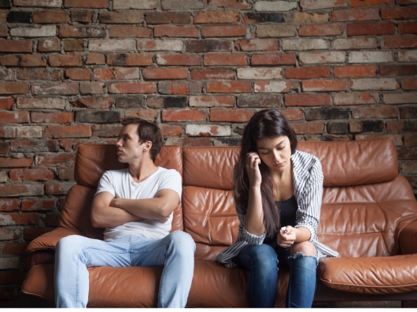 frustrated couple sitting togethor