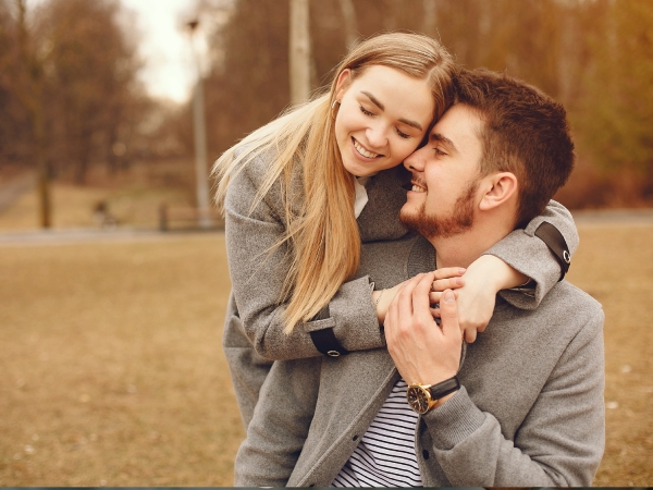 Happy couple spending time in park