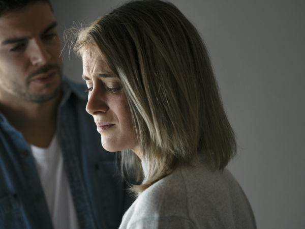 man woman in breakup