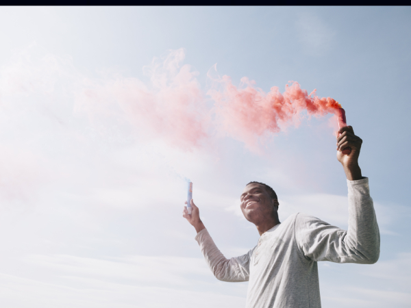 man holding Fireworks