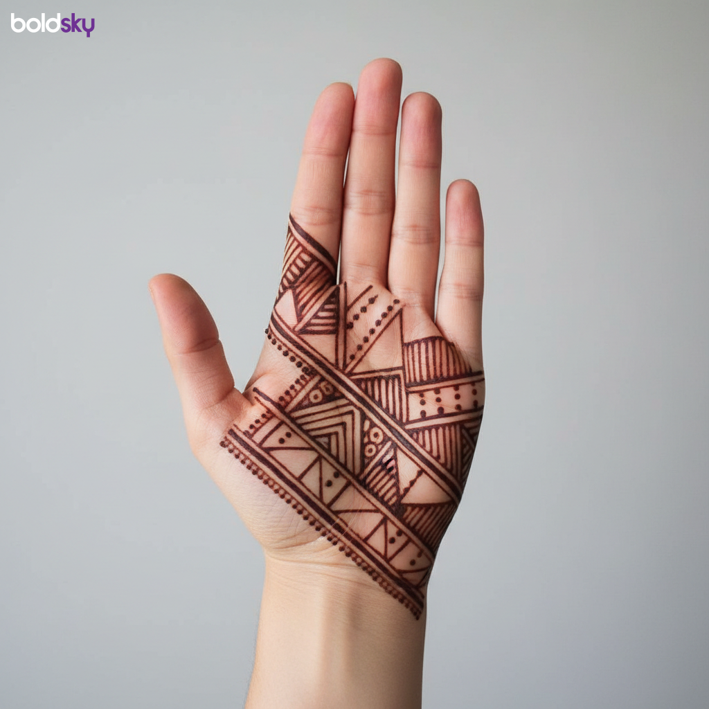 left hand full palm geometric mehndi.