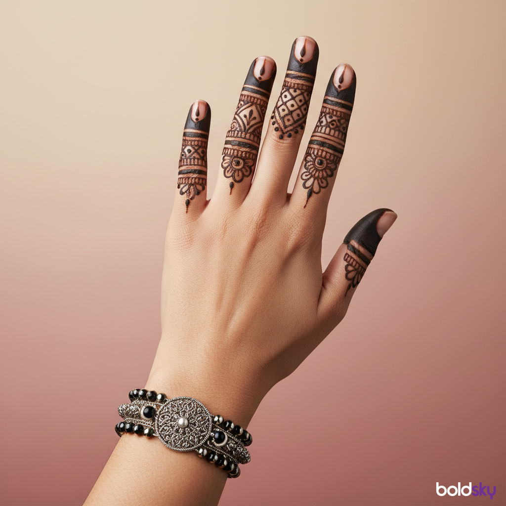 Left back groom mehndi fingertips wrist.