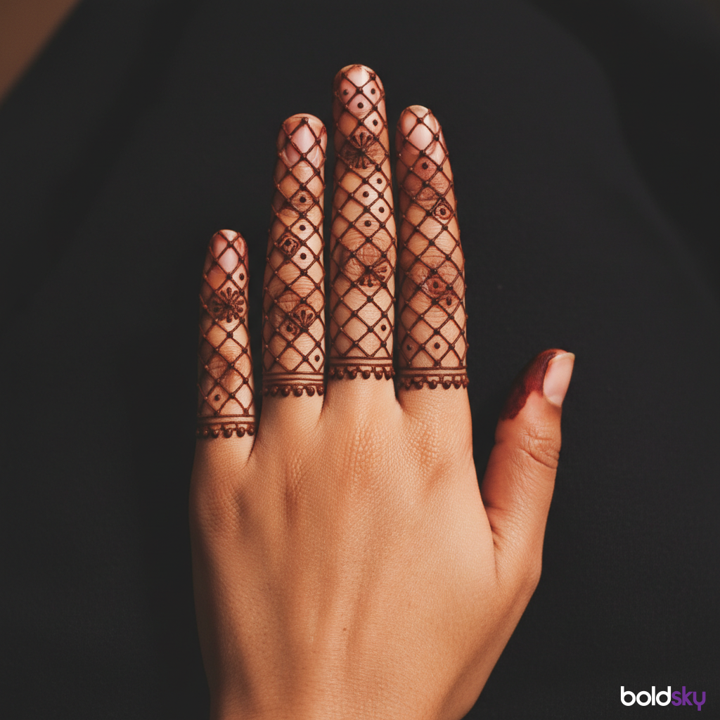Back hand simple jaali finger mehndi.