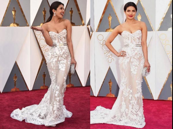 வெள்ளை நிற ஸ்லீவ்லெஸ் கவுன்