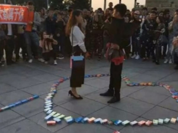 Man Confesses His Love With 999 Boxes of Condoms and a Bouquet of Thongs Man Confesses His Love With 999 Boxes of Condoms and a Bouquet of Thongs