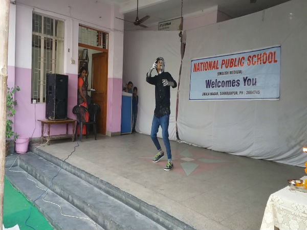 பள்ளி ஒருங்கிணைப்பாளர் சிம்பிள் மகானி 