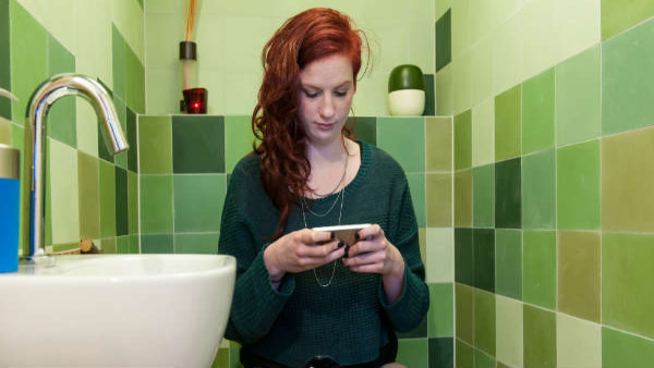 Why You Should Stop Taking Your Phone to Bathroom in Tamil