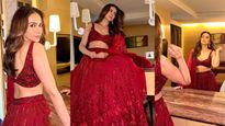 Rakul Preet Singh: అద్దంలో పరువాలు చూసుకుంటున్న రకుల్.. మెరూన్ లెహంగాలో అదిరిపోయిందిగా