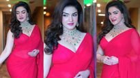 Honey Rose: ఎరుపెక్కిన పరువాలతో మత్తెక్కిస్తున్న హనీ రోజ్, బరువైన అందాలతో రచ్చ 