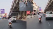 రియల్ ఇండియన్ పెళ్లాం: కదులుతున్న బండిమీద మహిళ చేసిన పనికి షాక్..వీడియో చూడండి
