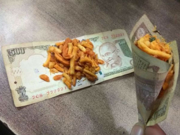 చింపేసిన నోట్లు