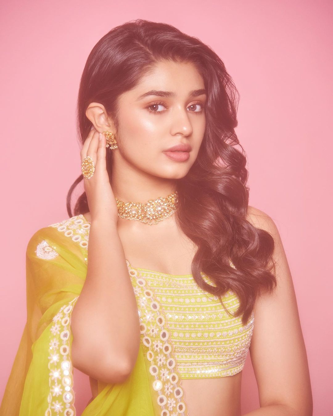 Actress Krithi Shetty Stunning Stills In Yellow Color Lehenga