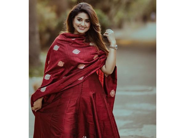 Actress Sneha beautiful pictures in red color dress
