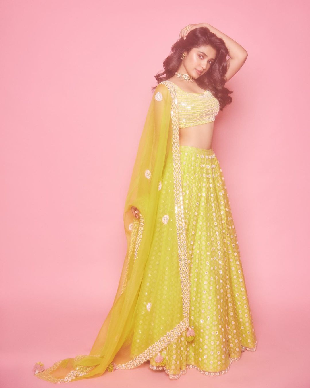 Actress Krithi Shetty Stunning Stills In Yellow Color Lehenga