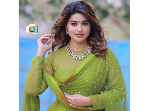 Actress Sneha beautiful pictures in red color dress