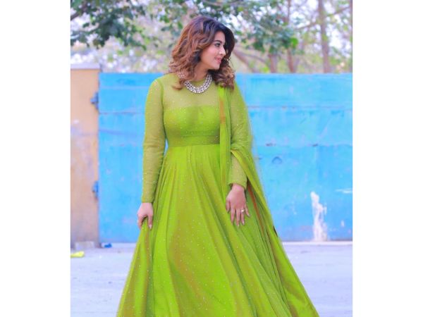 Actress Sneha beautiful pictures in red color dress