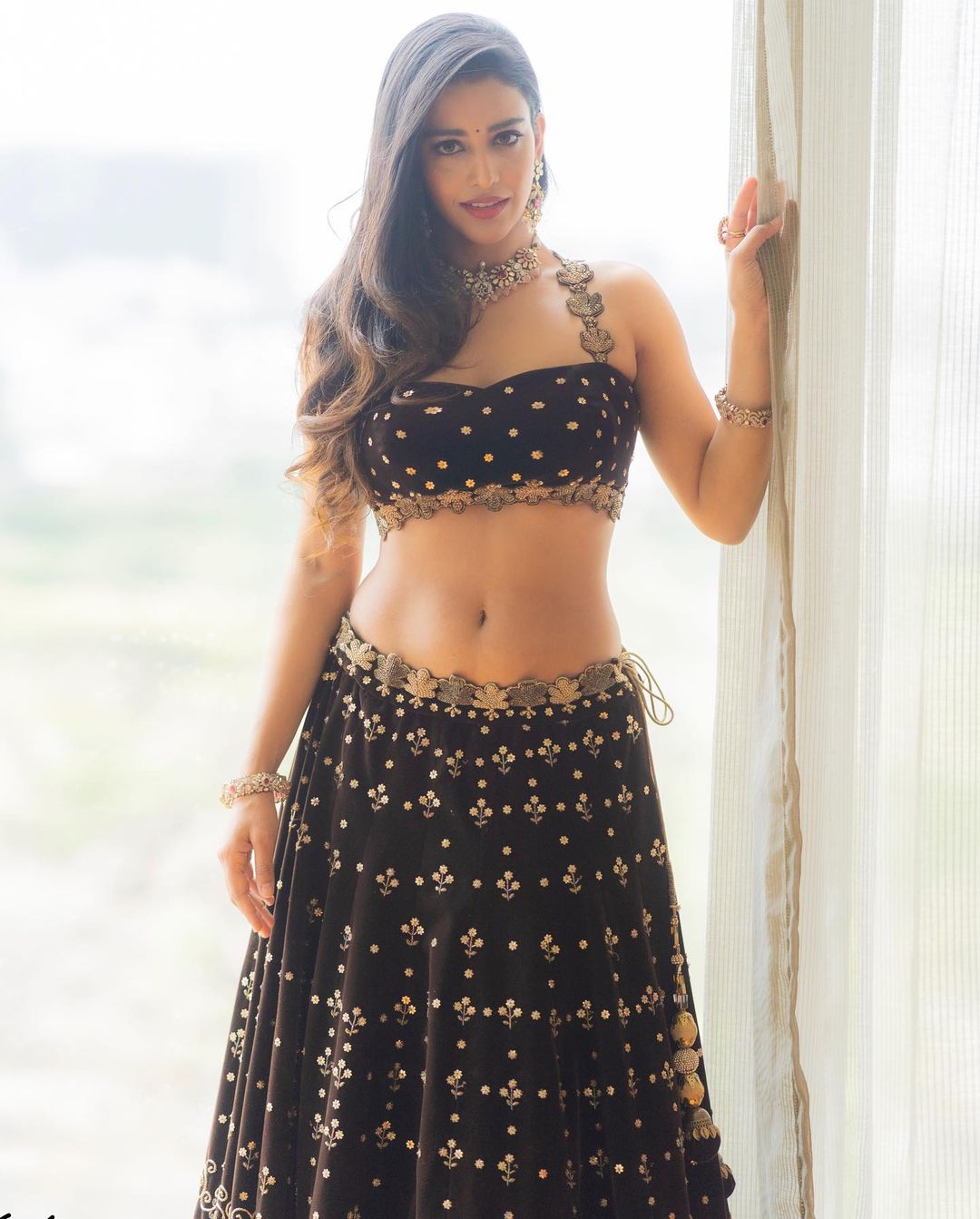 Actress Daksha Nagarkar Ravishing Photos In Black Lehenga