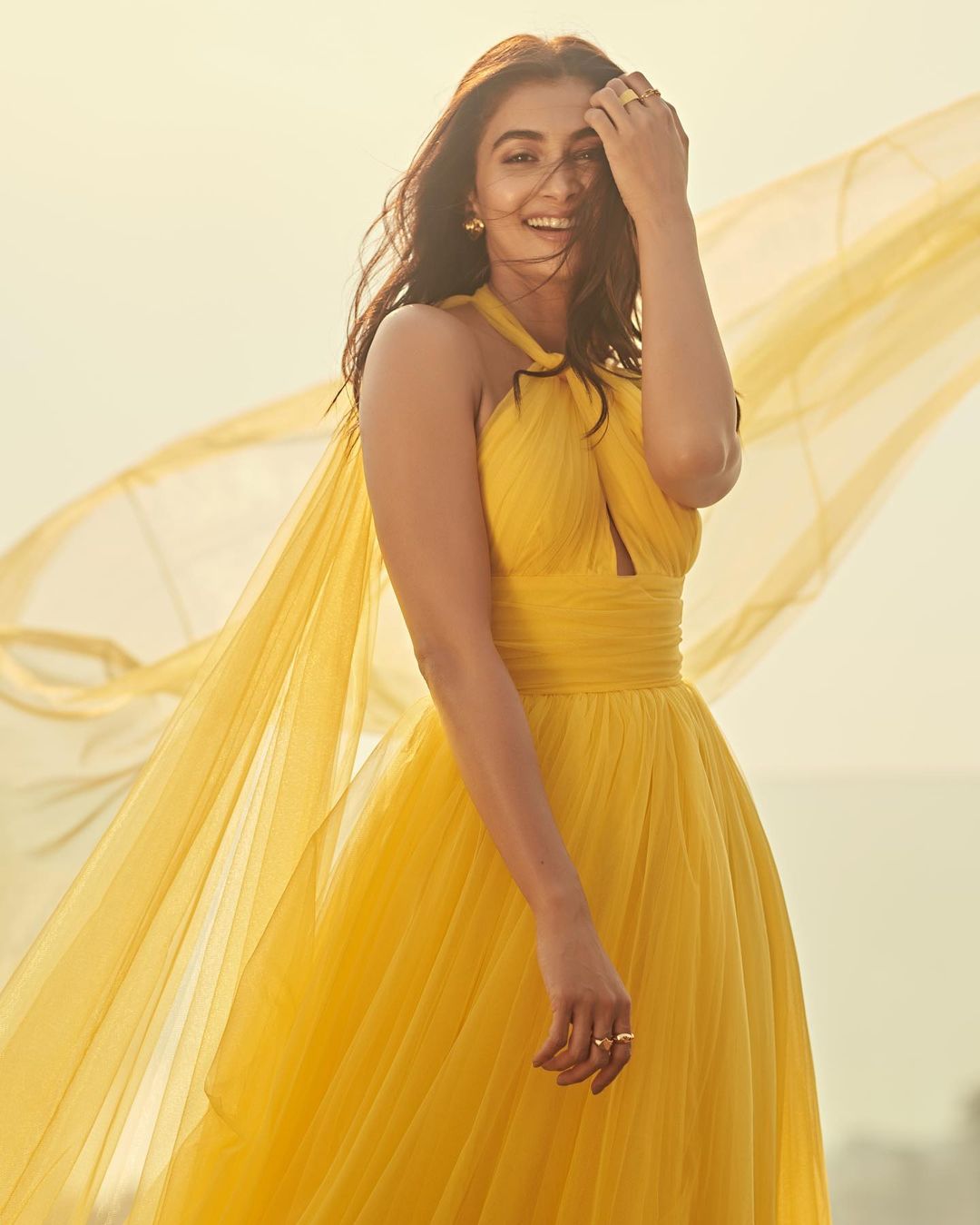 Actress Pooja Hegde Stunning Photos In Yellow Dress