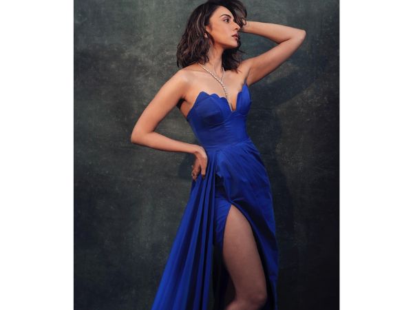 Actress Rakul Preet Singh Glamorous Stills In Blue Color Side Slit Dress