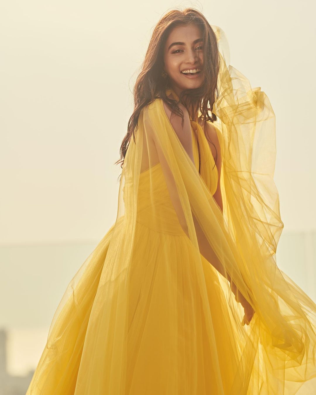 Actress Pooja Hegde Stunning Photos In Yellow Dress