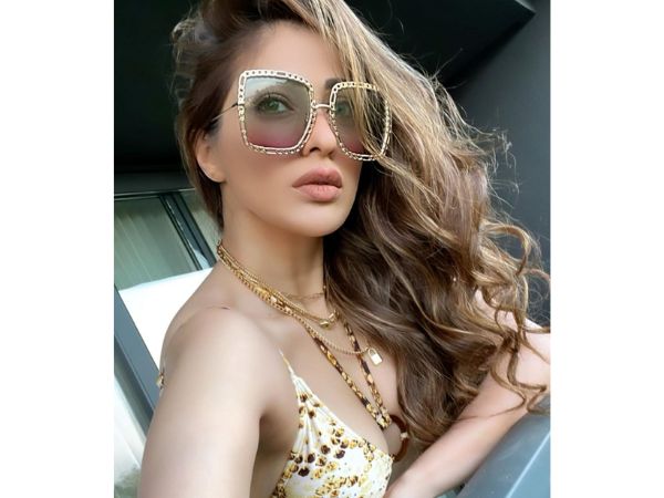 Actress Raai Laxmi Ravishing Stills In Western Outfit